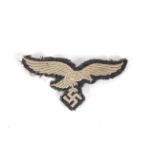 A WWII era Luftwaffe eagle cloth badge