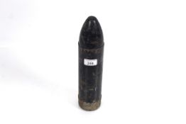 A 76,mm shell head, dated 1/89 and inert