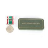 A cased W.R.V.S. Long Service medal with clasp and