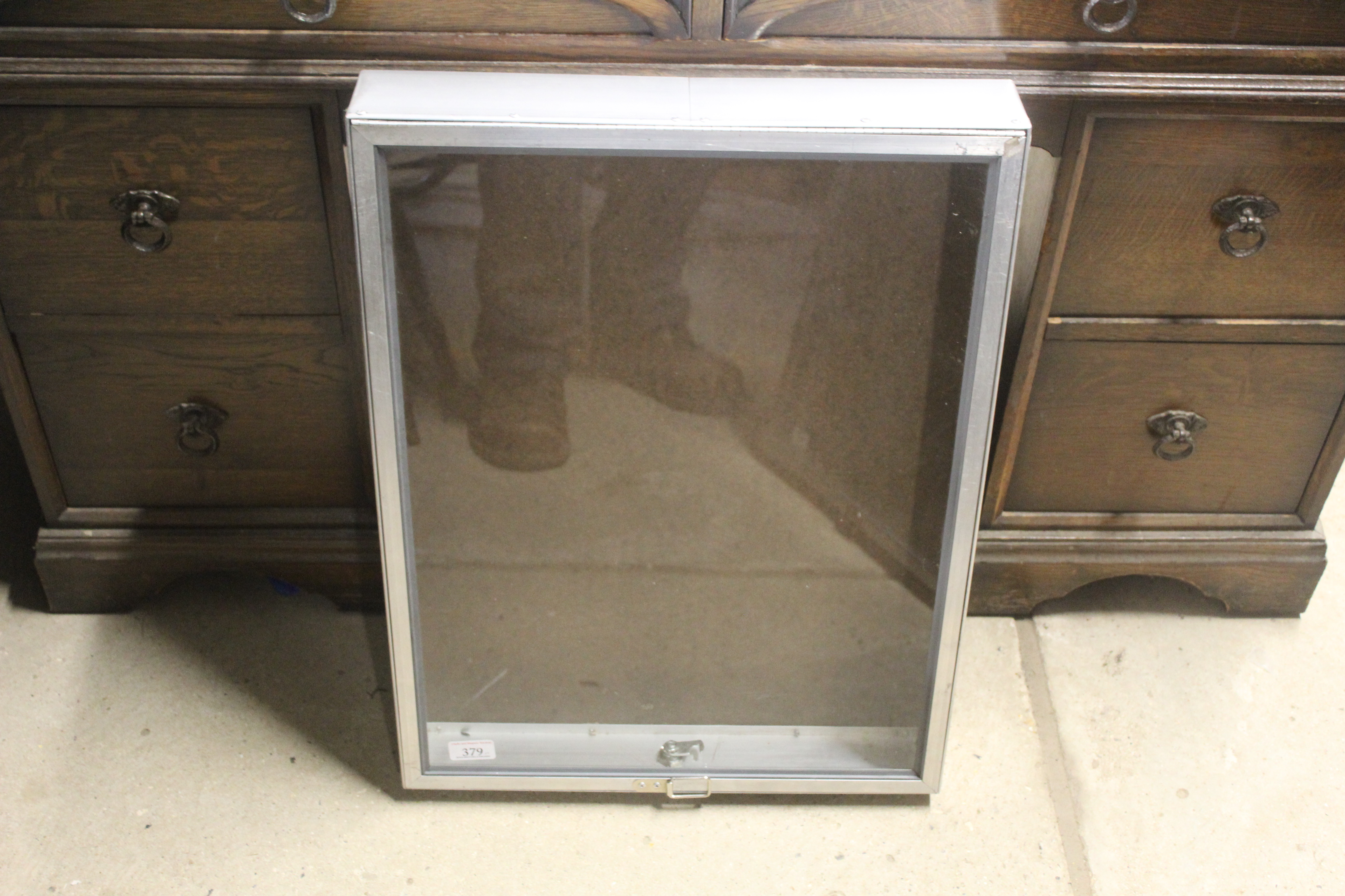 An aluminium glazed display case