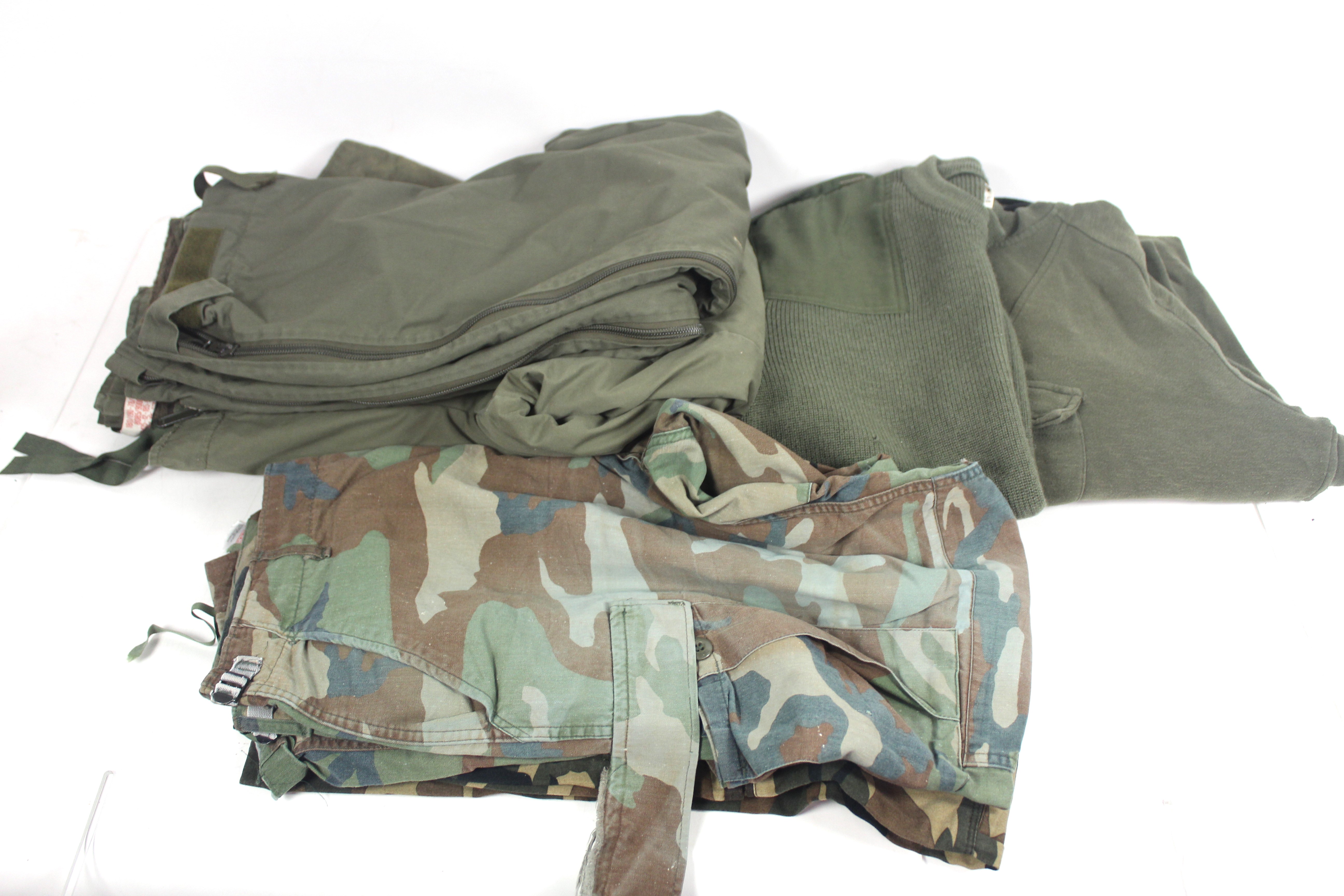 A quantity of various military style clothing