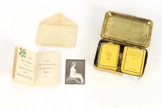 A Queen Mary 1914 Christmas Gift Tin containing ca