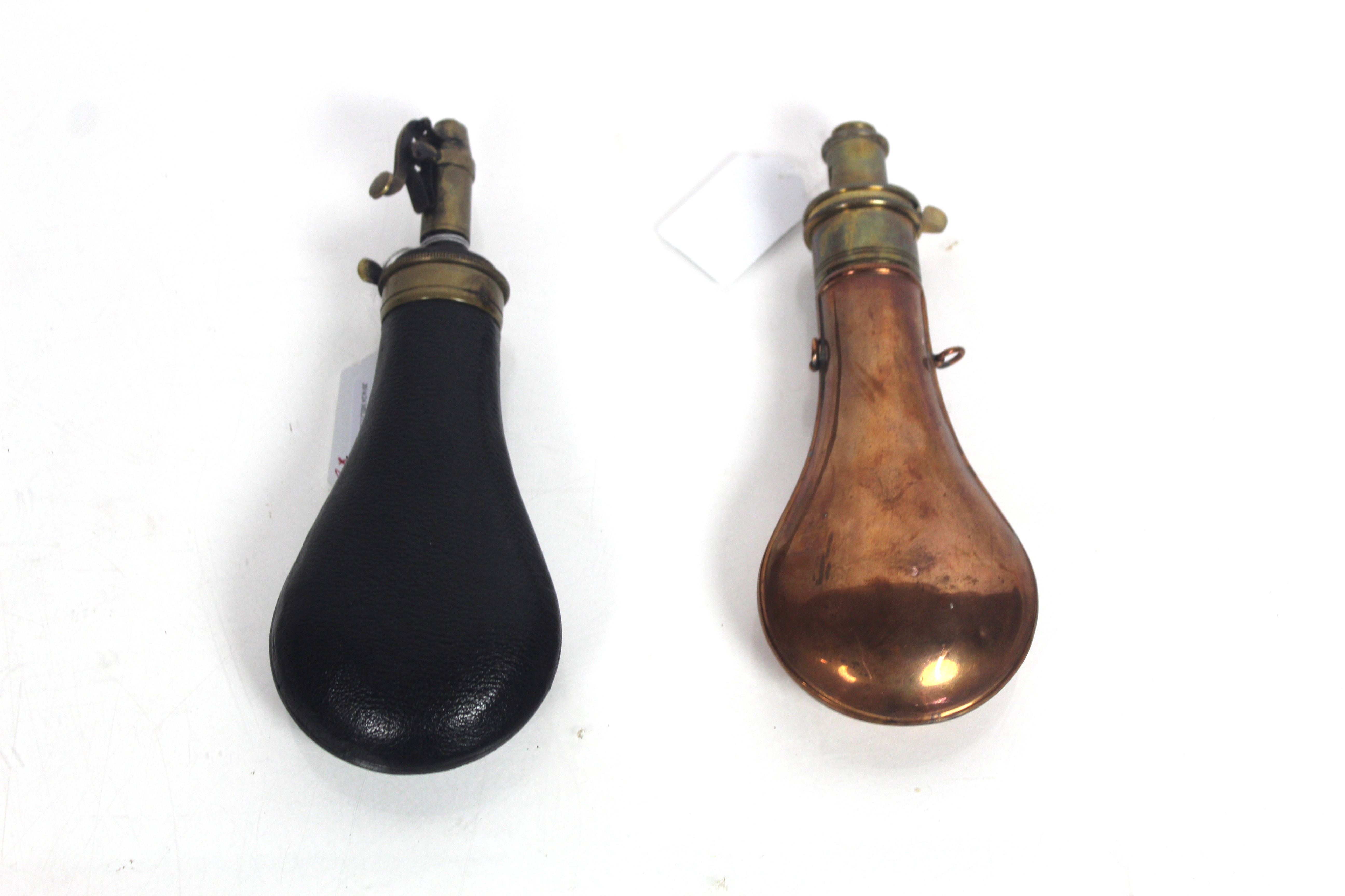 A leather covered rifle powder flask by Parker Hal