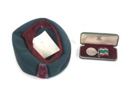 A W.R.V.S. hat with cased medal