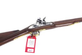 A .75" bore "Flintlock" action shot gun N.V.N. in