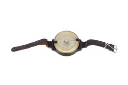 A Luftwaffe wrist compass, a used example with rep