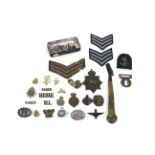 A quantity of various badges etc. most military re