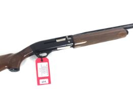 A 12 bore self-loading shotgun by Winchester. This