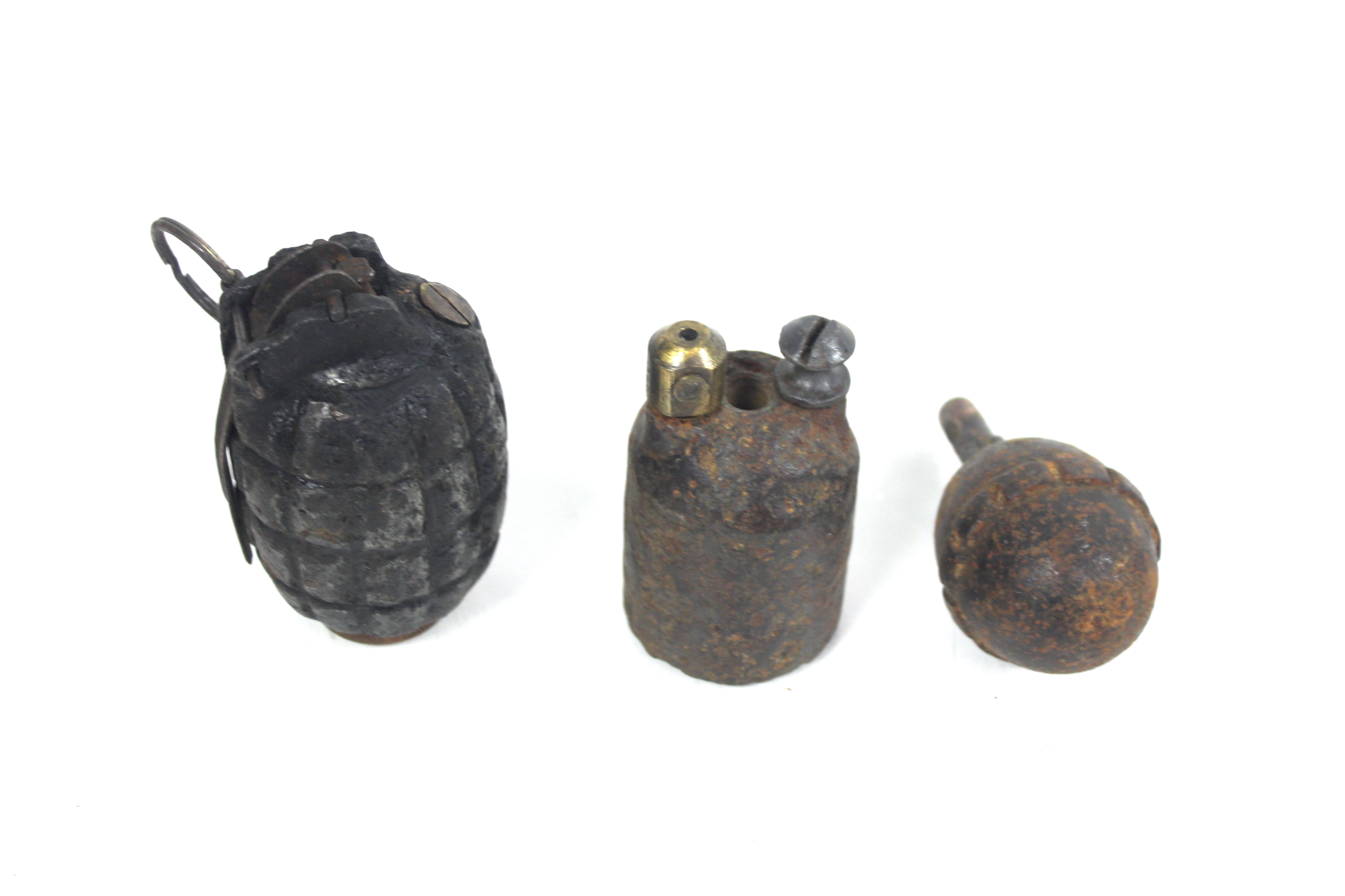 A WWI era German egg grenade, with French rifle gr