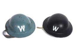 Two Home Service helmets dated 1941 & 1952