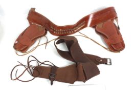 Two Western style gun rigs, a single and a double,