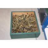 A large quantity of various brass rifle and pistol