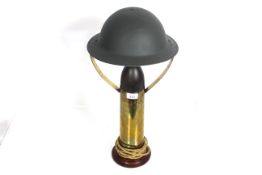 A lamp crafted from brass shell case with dummy he