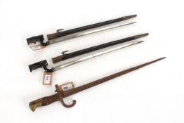 Two British model 1876 socket bayonets, both have