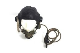 A WWII era leather flying helmets (C type) with ma