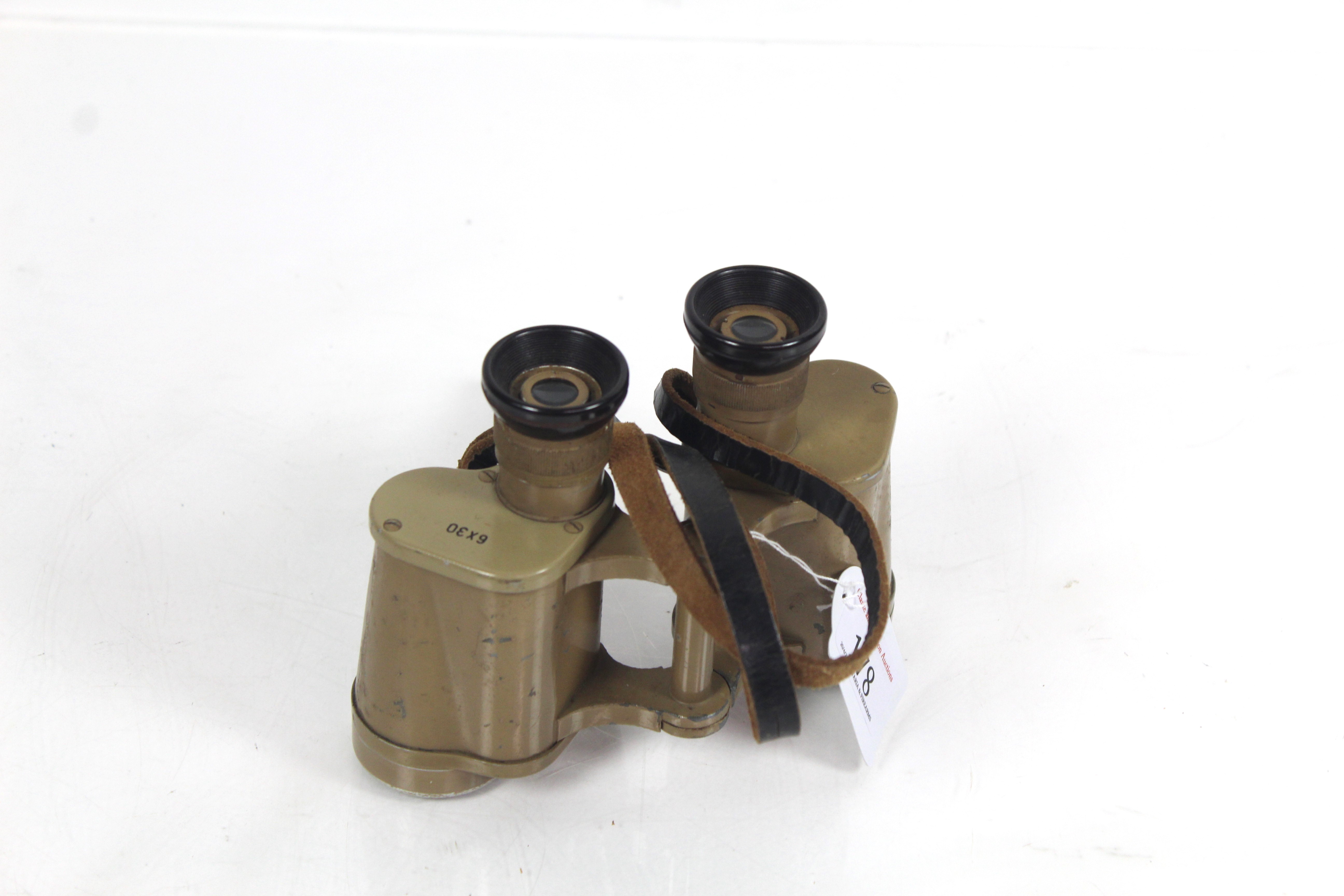 A pair of WWII era German binoculars marked 6x30 a