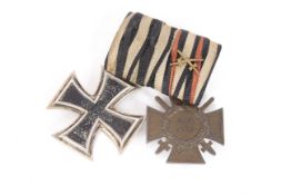 A WWI (Patt) Iron Cross 2nd Class with a Merit Cro