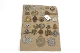 A card of 28 various military badges