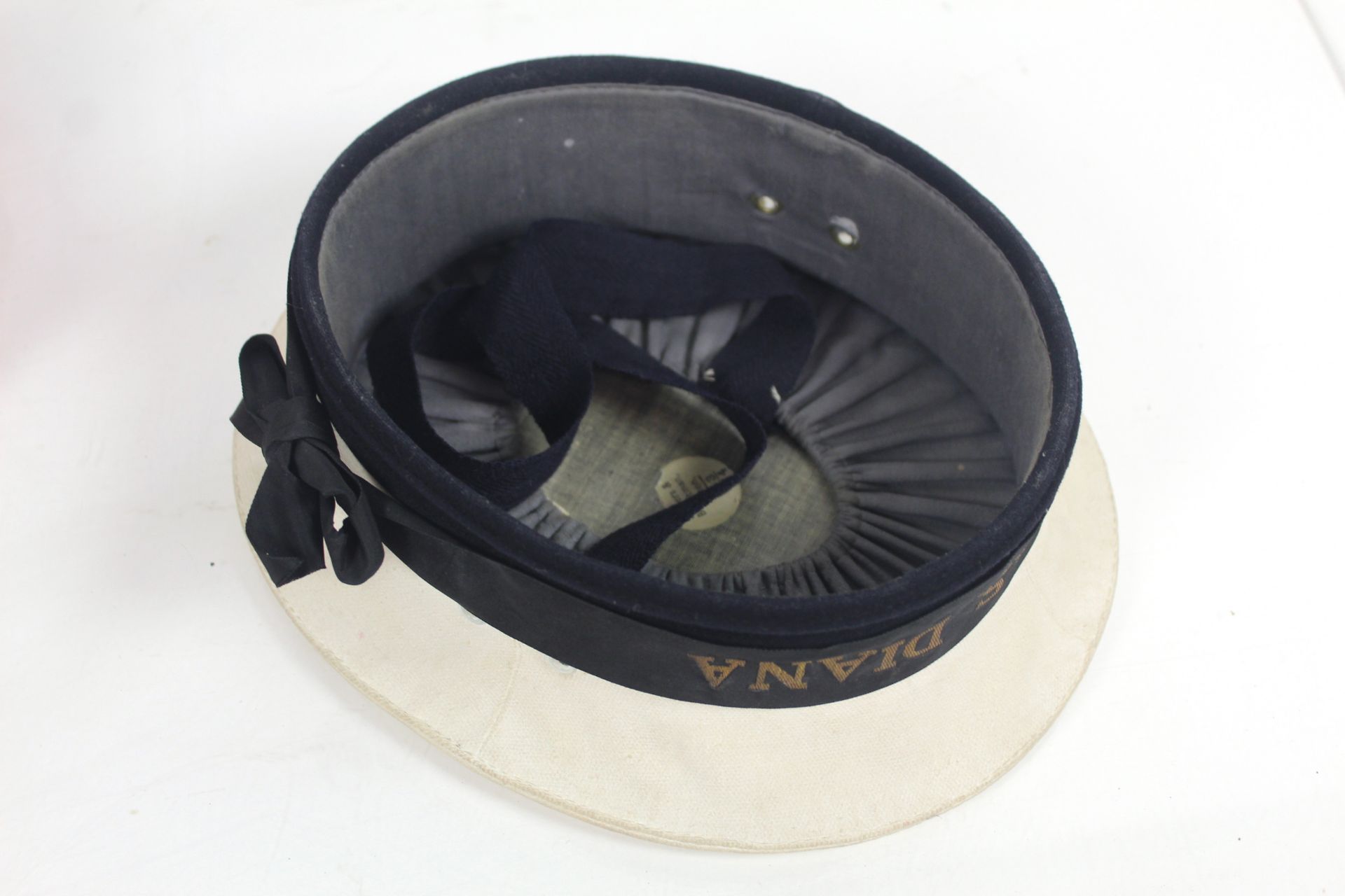 A Naval rating cap with H.M.S. Diana Tally, with a - Image 4 of 6