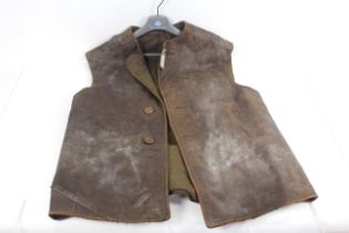 A WWII era leather jerkin dated 1944 (NB some wear