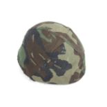 A U.S.A. helmet with camo cover