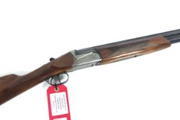 A Rex over and under 12 bore shotgun with 27½" bar