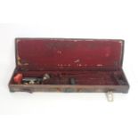 A vintage leather gun case for restoration