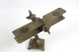 A "Trench Art" model bi-plane, the fuselage made f
