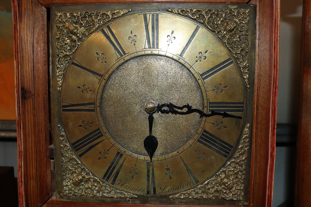 A pine long case clock with brass dial inscribed J
