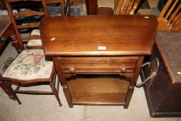 A good quality reproduction oak side table fitted