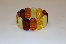 An amber one size bracelet, approx. 37gms