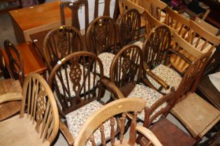 A set of six stick and wheel back dining chairs, f
