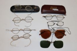 A box of yellow metal mounted and other spectacles