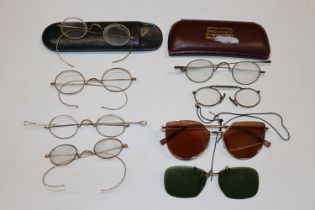 A box of yellow metal mounted and other spectacles