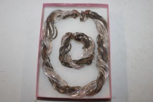 A boxed Ben De Lisi necklace and bracelet