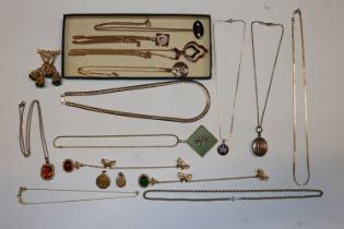 A collection of gold tone jewellery, mainly neckla