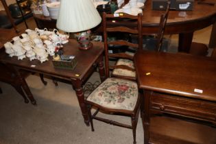 A pair of early 20th Century ladder back bedroom c