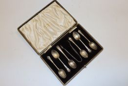 A case containing five silver teaspoons, one other