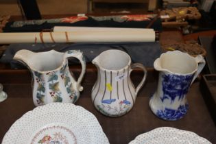 Three Victorian baluster jugs