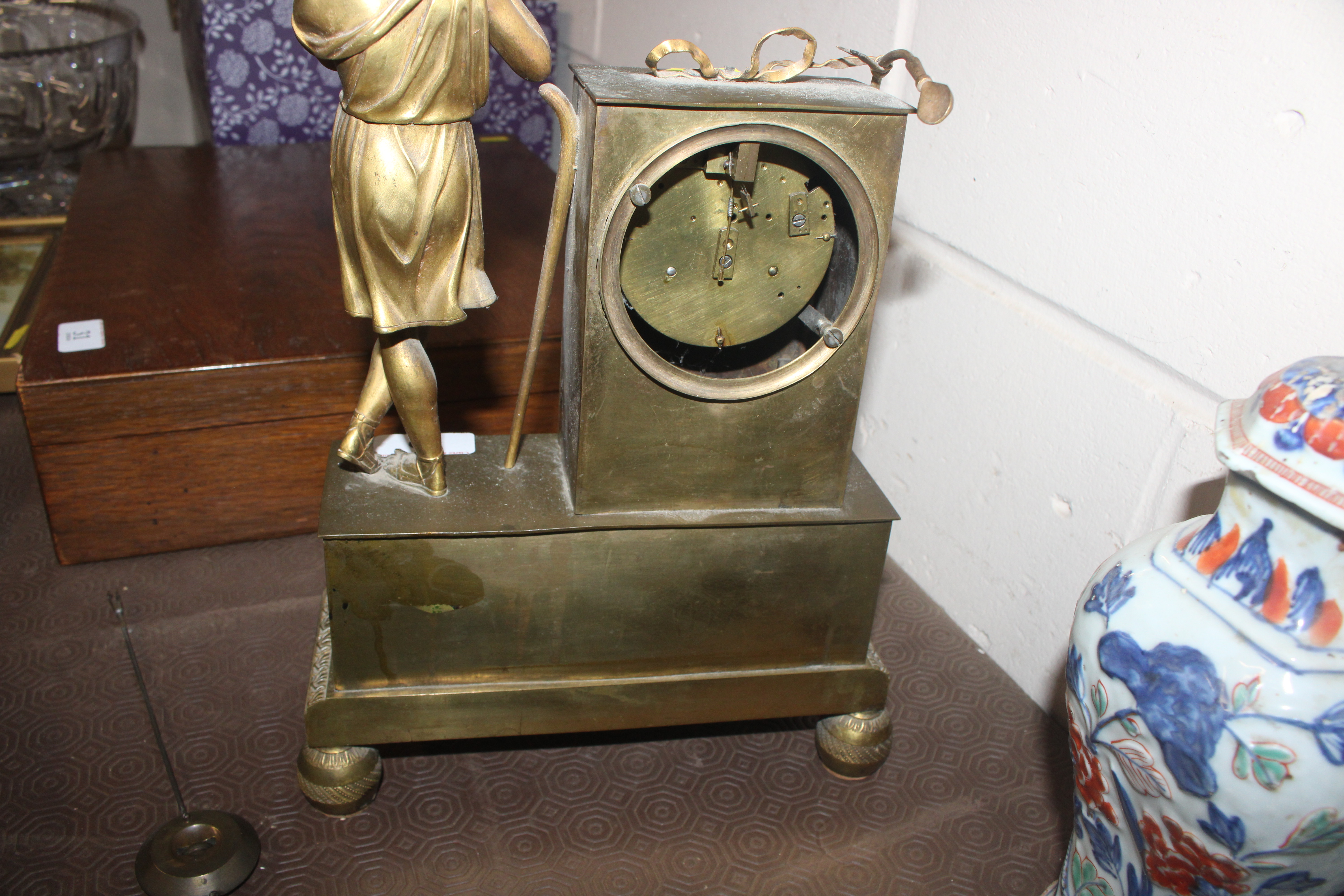 A 19th Century French gilt metal mantel clock with - Image 12 of 14