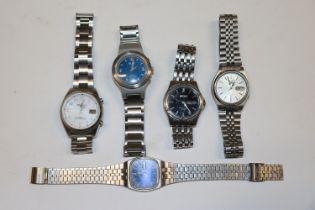 A Seiko 5 automatic wrist watch; two other Seiko watches; a Precision wrist watch; and Klik wrist