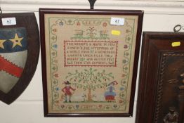 A sampler dated 1927 with verse, flowers and figur
