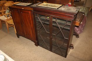 A Regency mahogany astragal glazed bookcase on cup