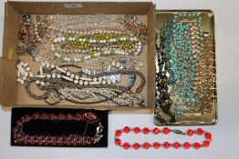 A box of vintage and other costume jewellery, main
