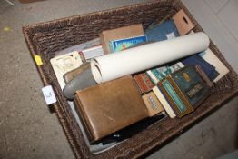 A wicker basket and contents of various games etc.
