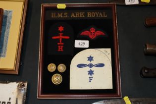 A WWII Royal Naval cloth badge collection mounted