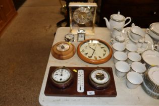 A clock and barometer set; a Sestrel alarm clock;