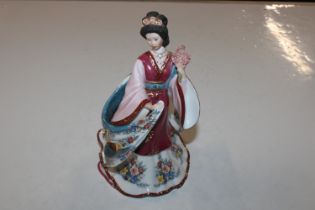 A Danbury Mint figure "The Plum Blossom Princess"