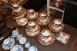 A quantity of late Victorian floral pattern tea wa