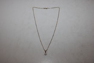 A 18ct gold mounted diamond pendant, approx. ¼cara